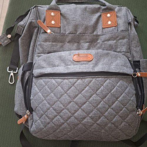Baby backpack like new with multiple compartments and three insulated bottle holders