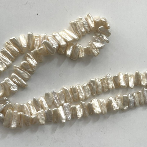Vintage pearl necklace with elongated cultured white pearls like new
