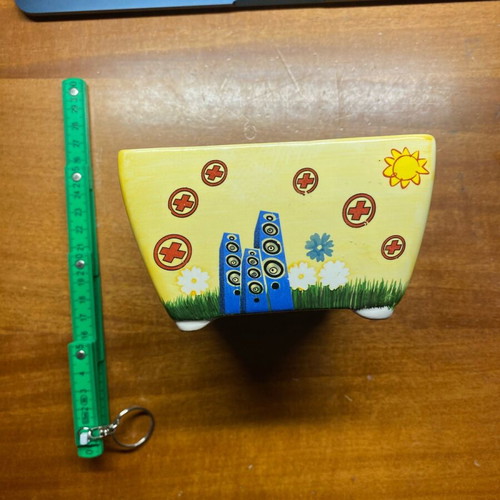 Clay container used with painted design