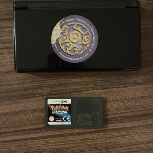 Nintendo DS Lite console like new with leather case and 2 Pokémon cartridges