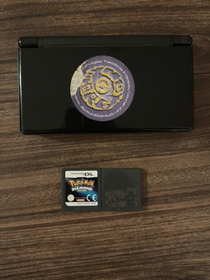 Nintendo DS Lite console like new with leather case and 2 Pokémon cartridges