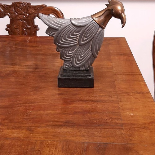 Decorative bird used with metal head and wooden base