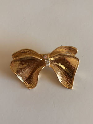 Gold-tone bow brooch, vintage style