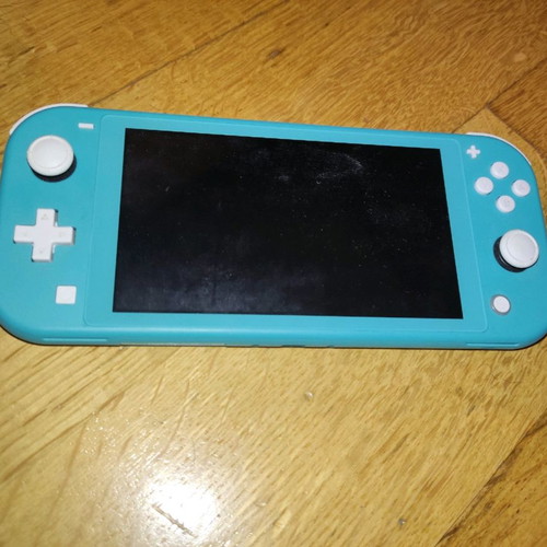 Nintendo Switch Lite Turquoise new with installed Animal Crossing