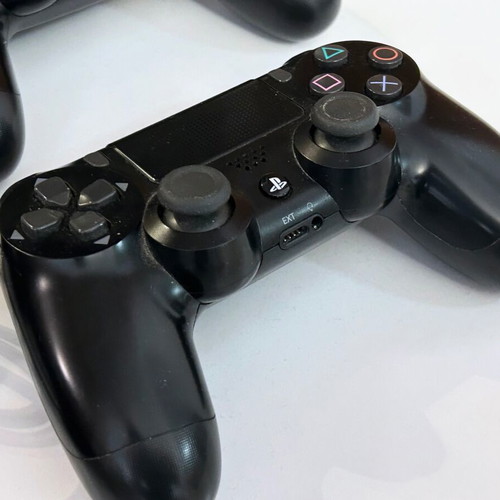 PlayStation 4 Slim 500GB like new with headset and 2 controllers