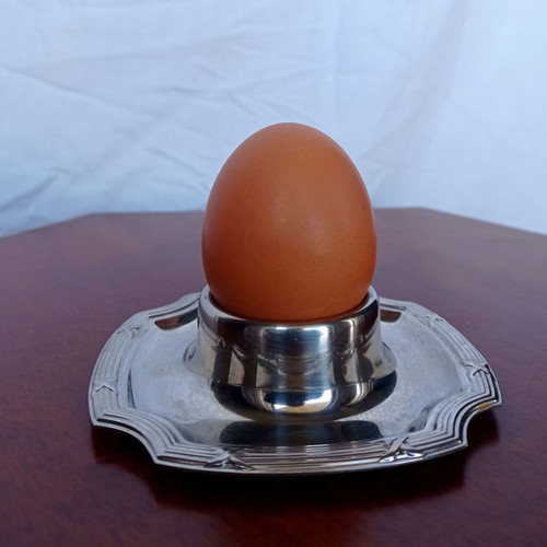 Metal egg holder used, silver color
