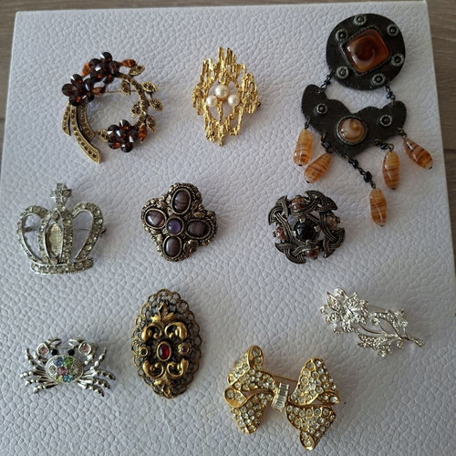 Vintage earrings with clips and pins, 17 pairs and 10 pins