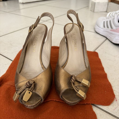 Peep toe heels used, size 38, bronze with leather knot detail