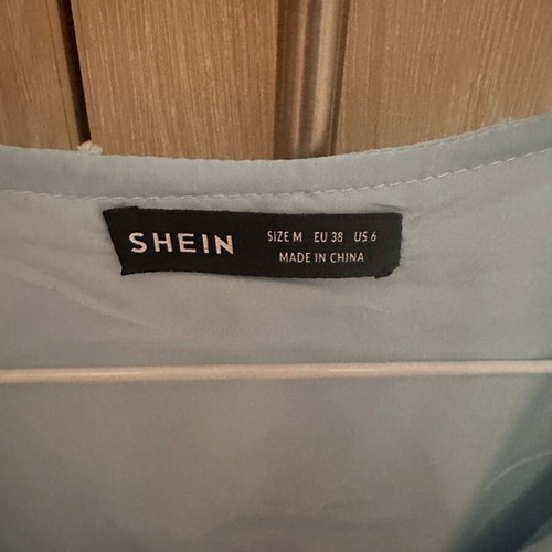 Medium blouse loose light blue used