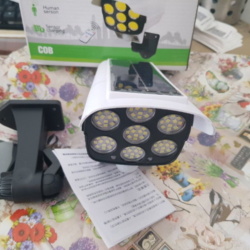 Solar floodlight with motion sensor C1232 and 77 LEDs, new