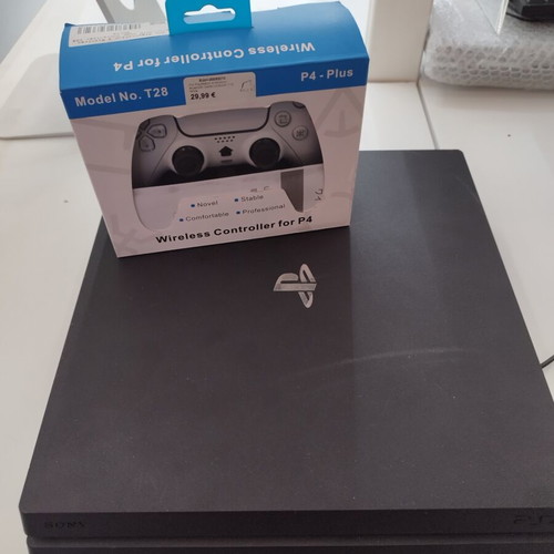 PlayStation 4 Pro with compatible controller like new