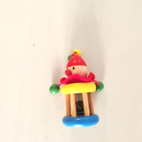 Vintage wooden clown rattle