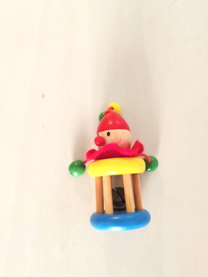 Vintage wooden clown rattle