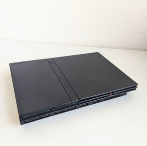 PlayStation 2 Slim + (7 free games)
