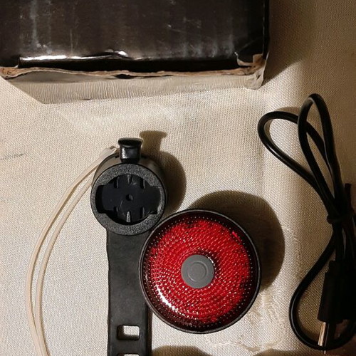 Rechargeable bicycle light with activation and braking sensor new