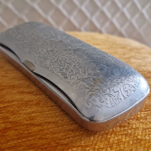 Vintage metal glasses case with embossed floral design, silver, used