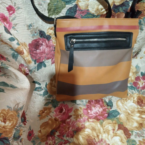 Bag with adjustable strap with minor corner wear
