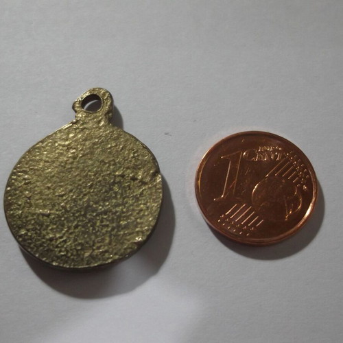 Metal pendant Sun of Vergina used, gold tone