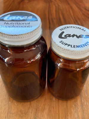 Lanes Nutritional Supplements ζευγάρι καφέ γυάλινων μπουκαλιών μεταχειρισμένο
