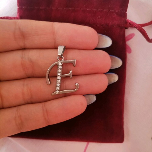 Monogram E jewelry used, silver with zircon, brass