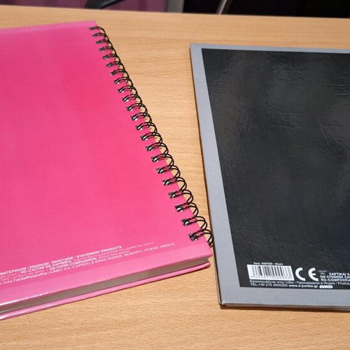 Spiral notebooks used, hard cover, 2 pieces, black and pink