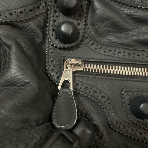Balenciaga handbag used with long shoulder strap and company mirror