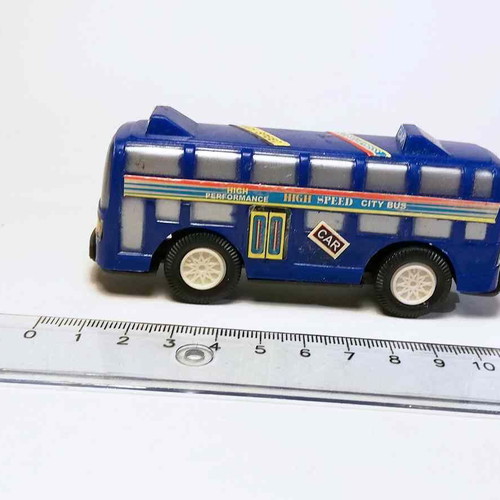 Plastic toy bus used with scratches and marks