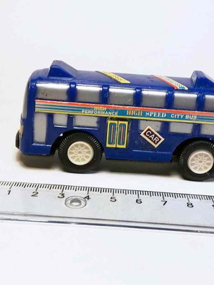 Plastic toy bus used with scratches and marks
