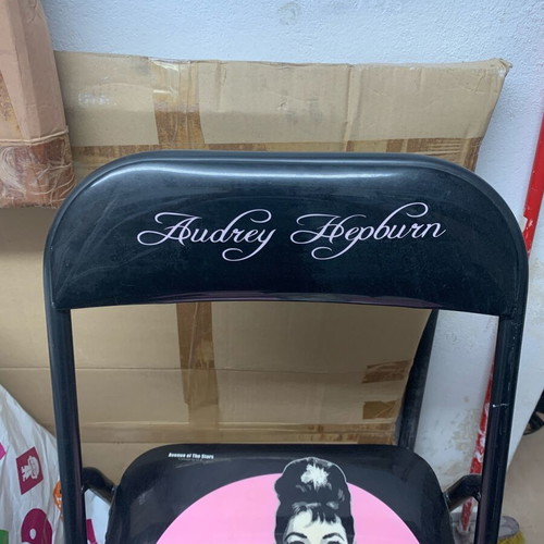 Chair with design used with minor wear