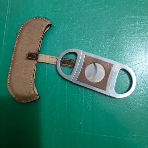 Luxury cigar accessory set with leather case and cutter