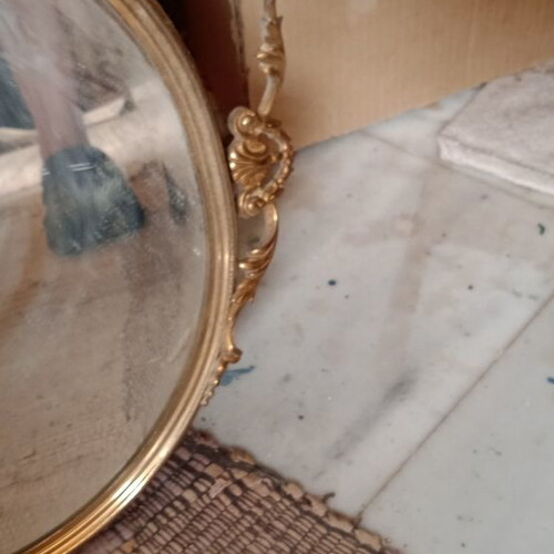 Mirror with metal frame used, gold color