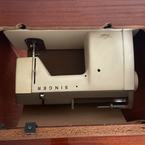 Singer electric sewing machine used, with cabinet