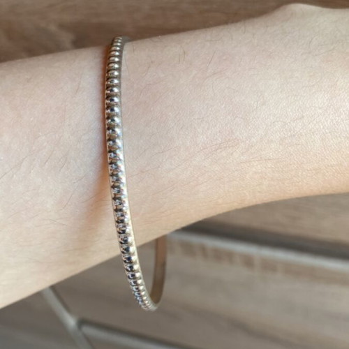 Metal bracelet like new, silver color with rounded protrusions