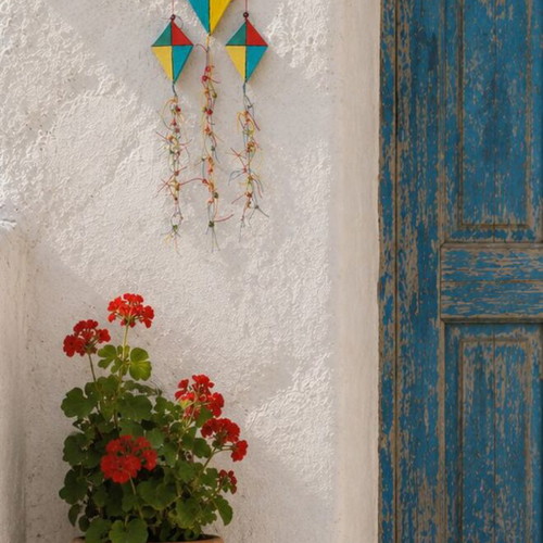 Handmade wooden kites handpainted with beads