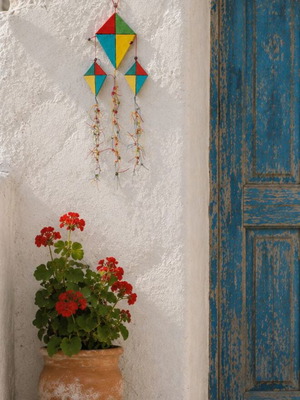 Handmade wooden kites handpainted with beads