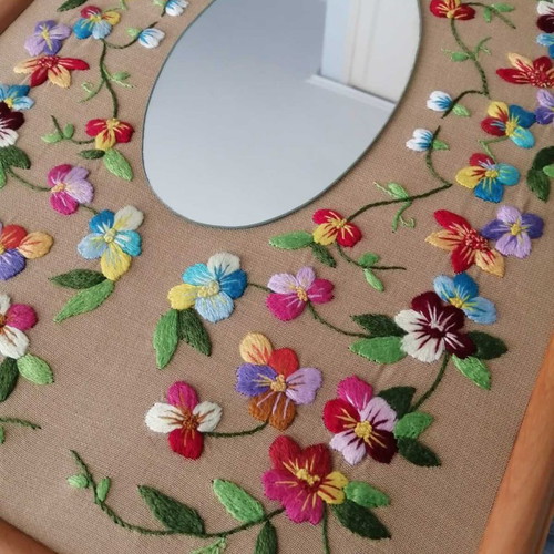 Embroidered frame used with mirror