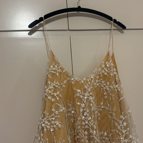 NidoDileda top with open back, yellow and white