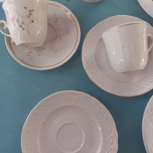 Set of 7 assorted cups and saucers