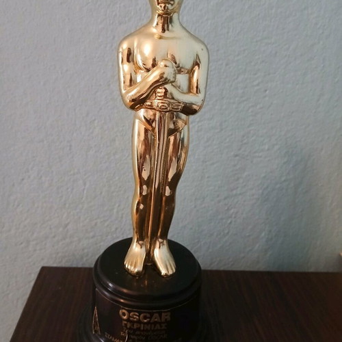 Oscar Grinias decorative plastic trophy used, funny gift