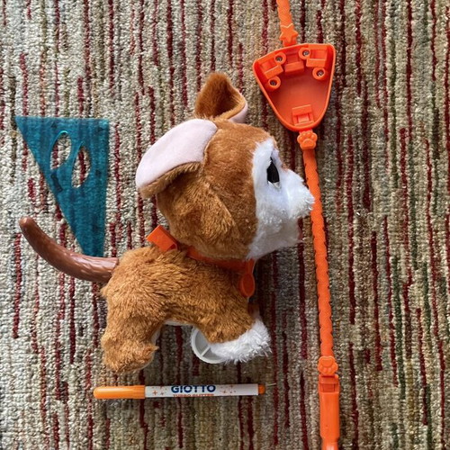 Dog toy with stick used, brown
