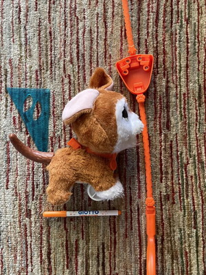 Dog toy with stick used, brown