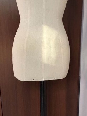 Sewing mannequin used with wooden leg