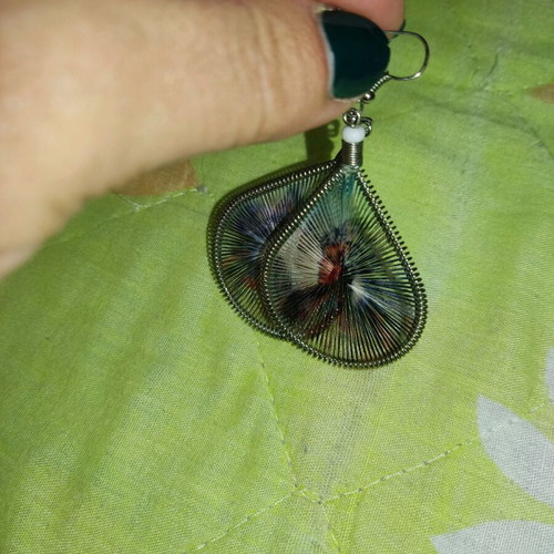 Dangling earrings like new with thread design