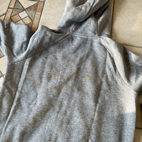 Nike jacket used gray with gold details and small defects