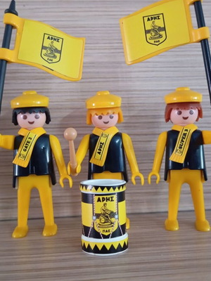 Playmobil Aris Football Fans Figures like new with flags and scarves