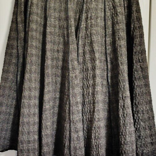 Skirt thick fabric with pleats new, size 46