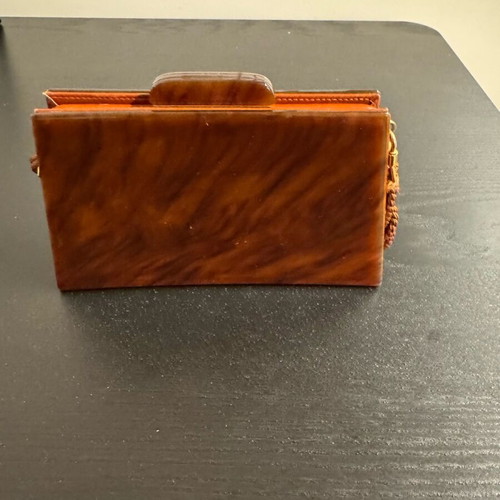 Vintage clutch used, leather inside and tortoise shell outside