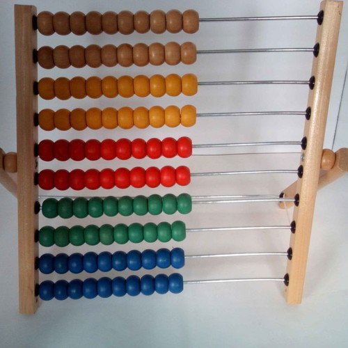 Wooden children's abacus counting frame used