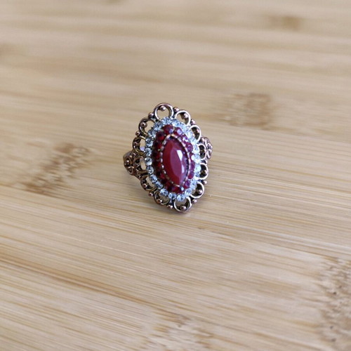 Vintage ring with red stone used