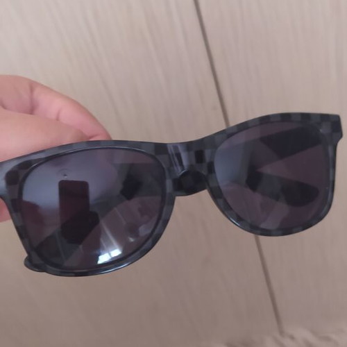 Vans sunglasses used with scratched lenses and slightly loose arms